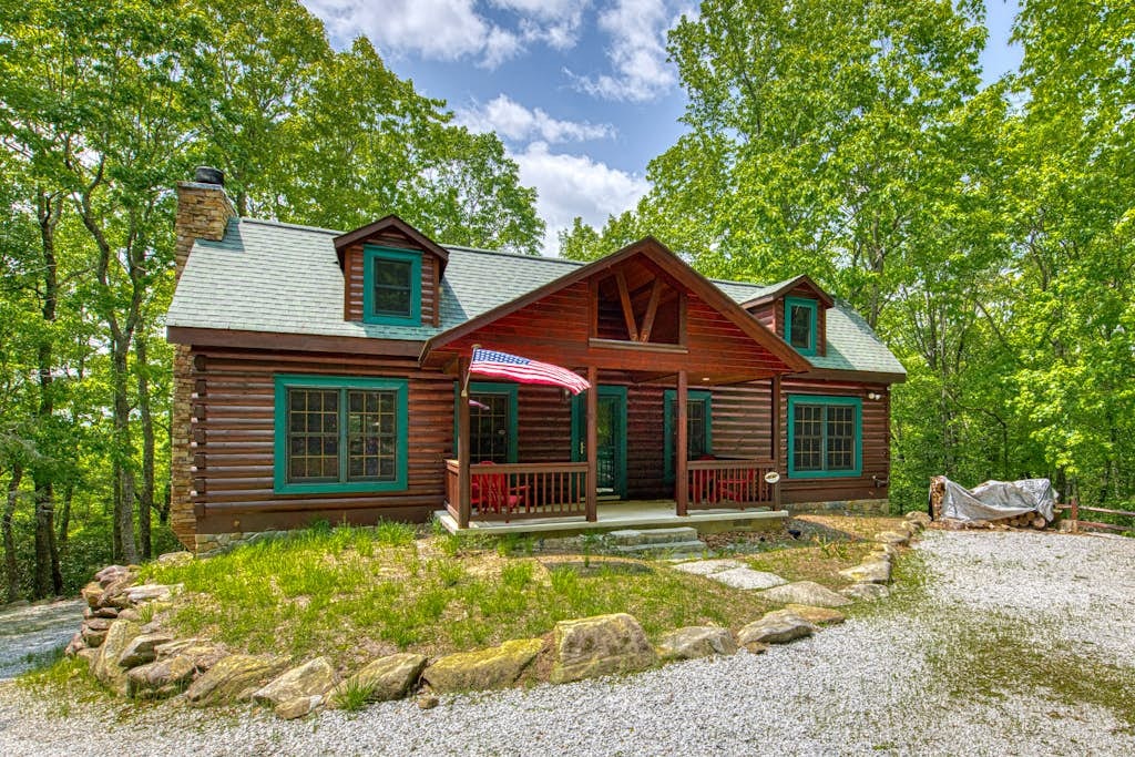 Fallen Leaf vacation cabin surrounded by trees in Highlands North Carolina